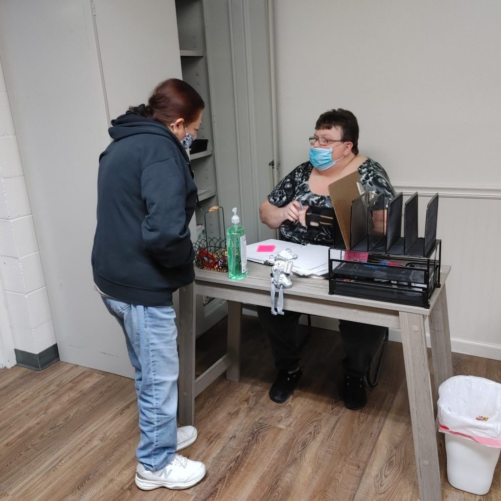 A welcoming conversation at Compassion Medical Clinic